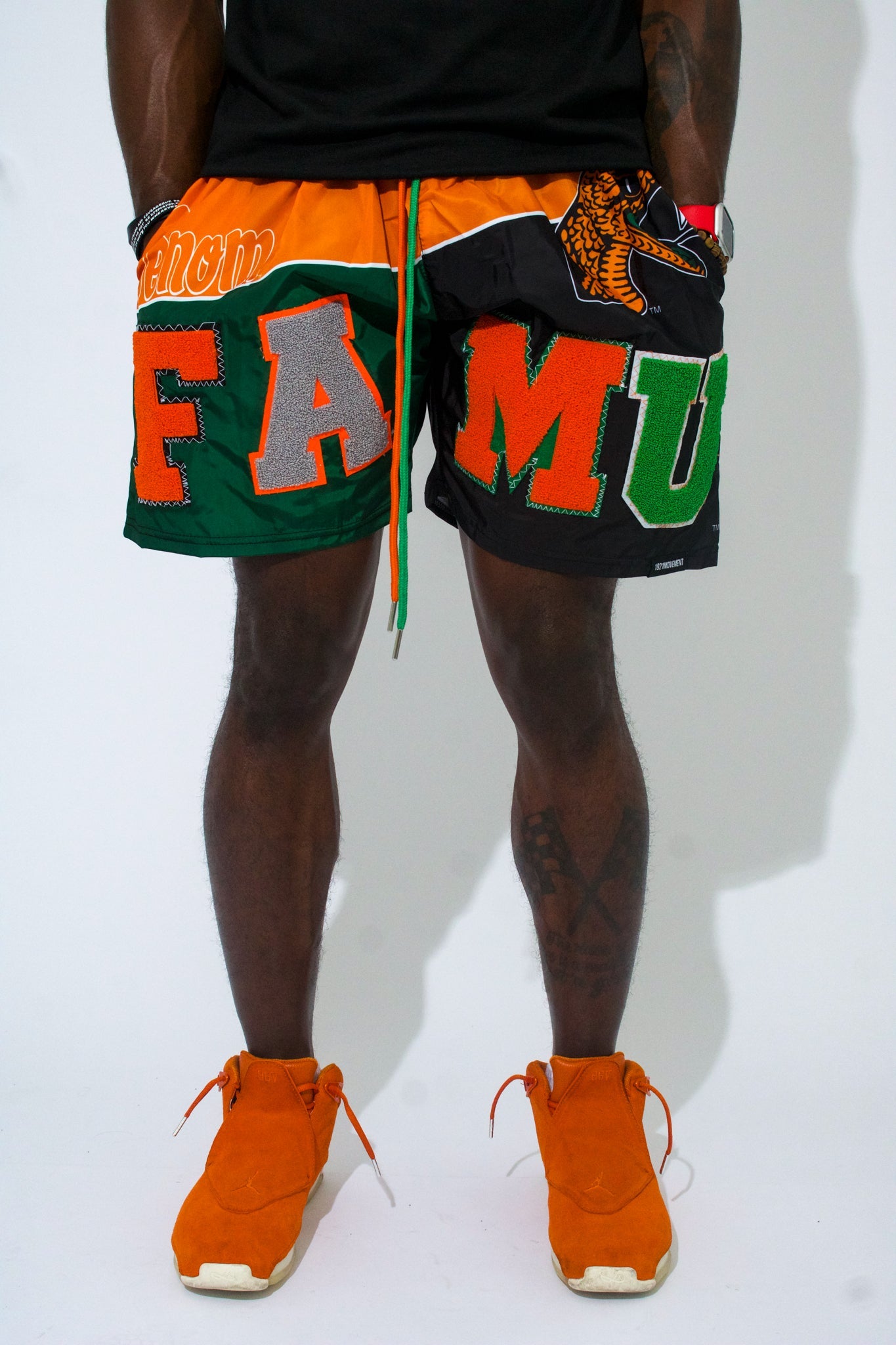 Model Wearing Nylon FAMU shorts - FAMU Apparel and Clothing - 1921 Movement