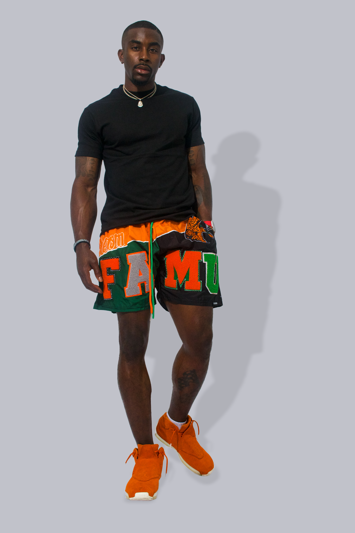 Model Wearing Nylon FAMU shorts - FAMU Apparel and Clothing - 1921 Movement