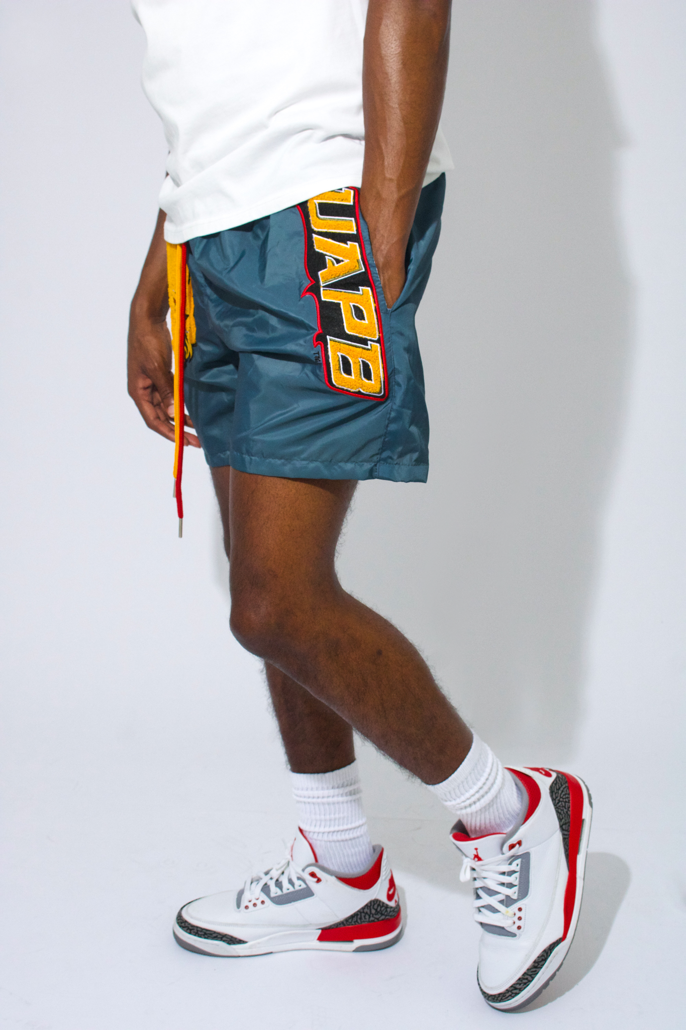 Model  wearing UAPB Shorts - UAPB Apparel and Clothing  - 1921 movement